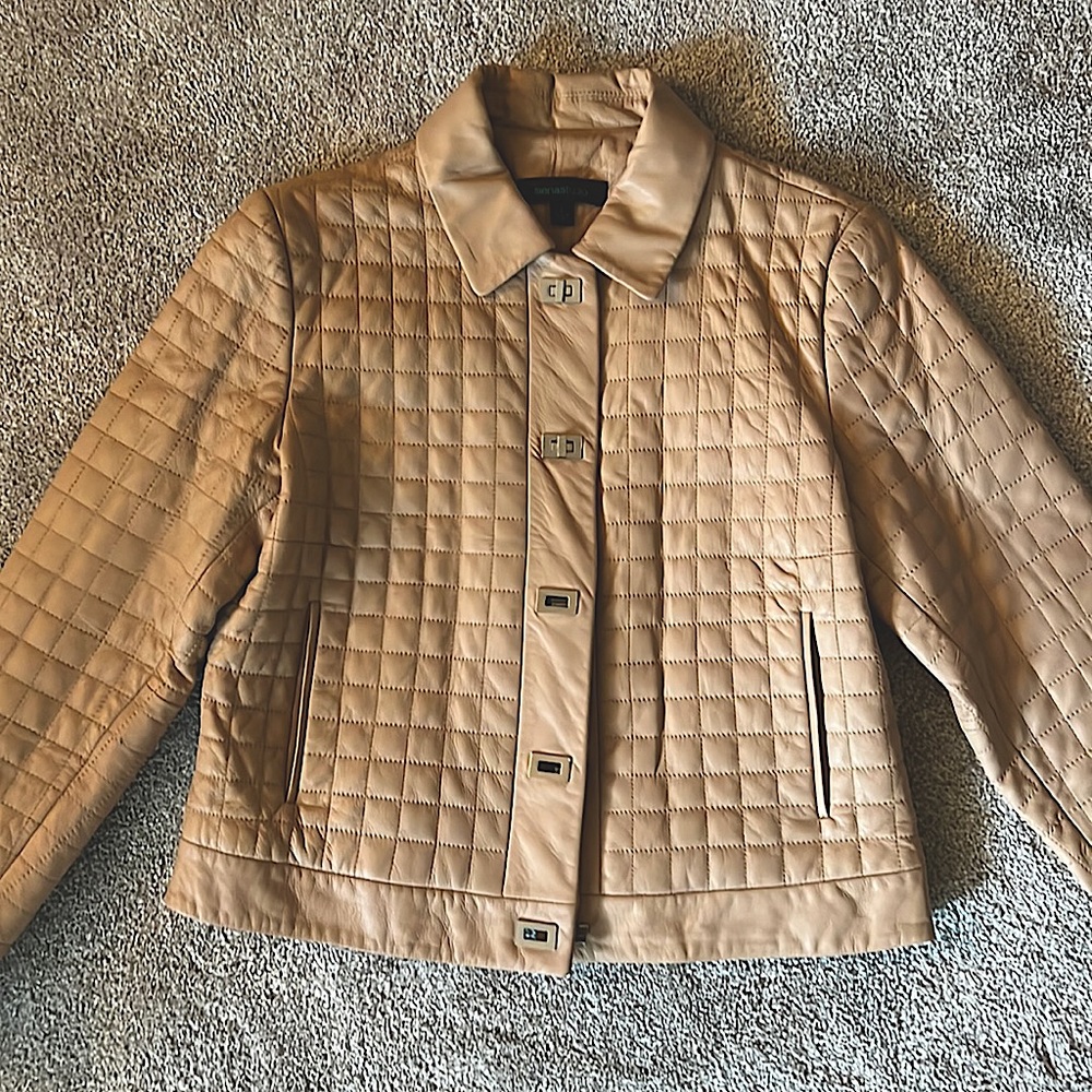 Beige leather jacket. Good condition. Size L